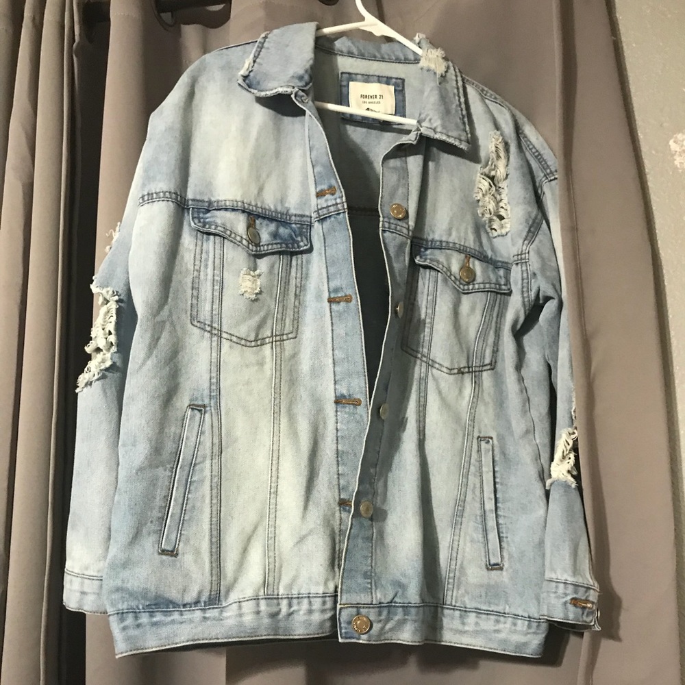 Distressed denim jacket size M
